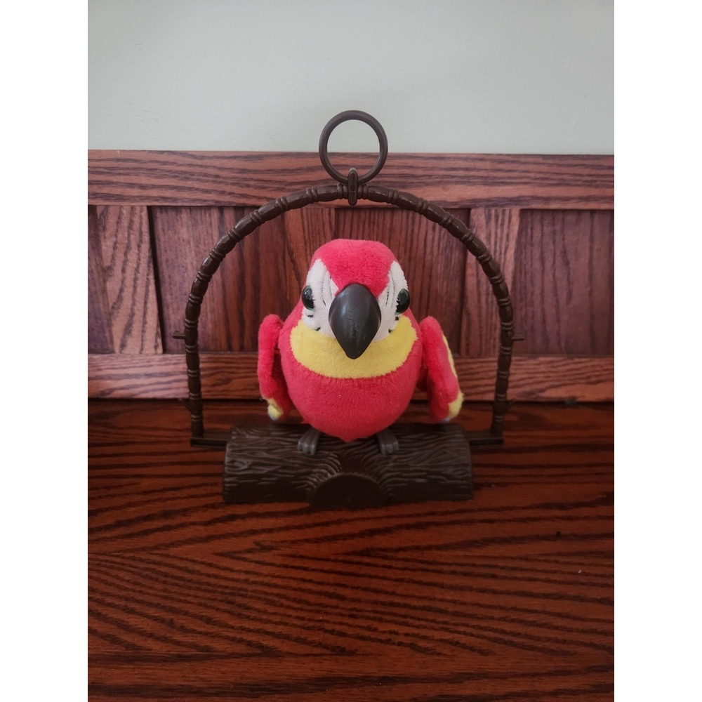 Repeat Talking Parrot on a Perch 2018 PMT Holdings LTD Tested